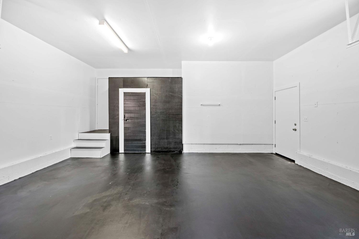 168 Ridgecrest Drive Napa, CA 94558 - Photo 37 of 39 an empty room with wooden floor & windows