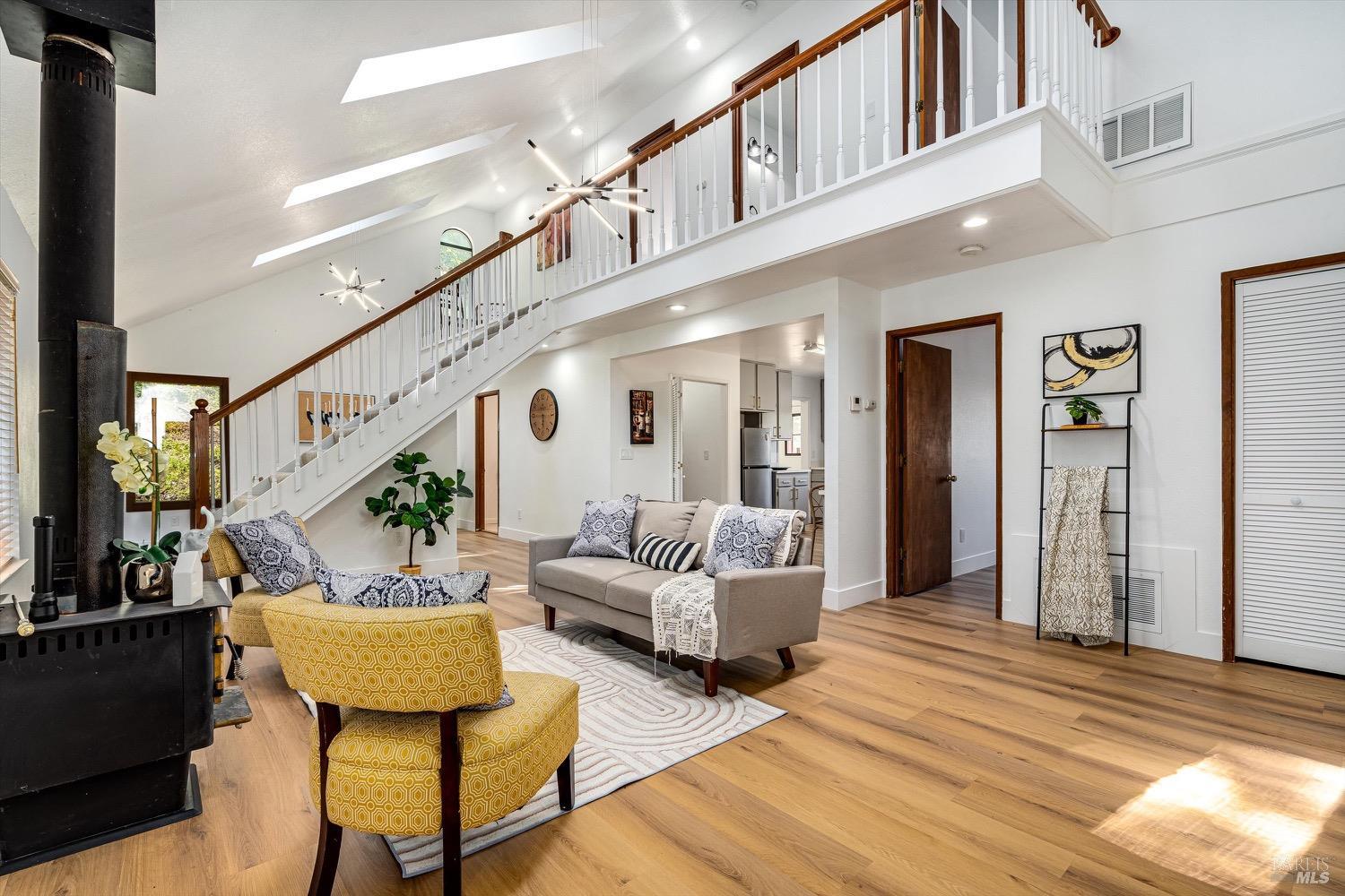 168 Ridgecrest Drive Napa, CA 94558 - Photo 5 of 39 a living room with furniture and a wooden floor
