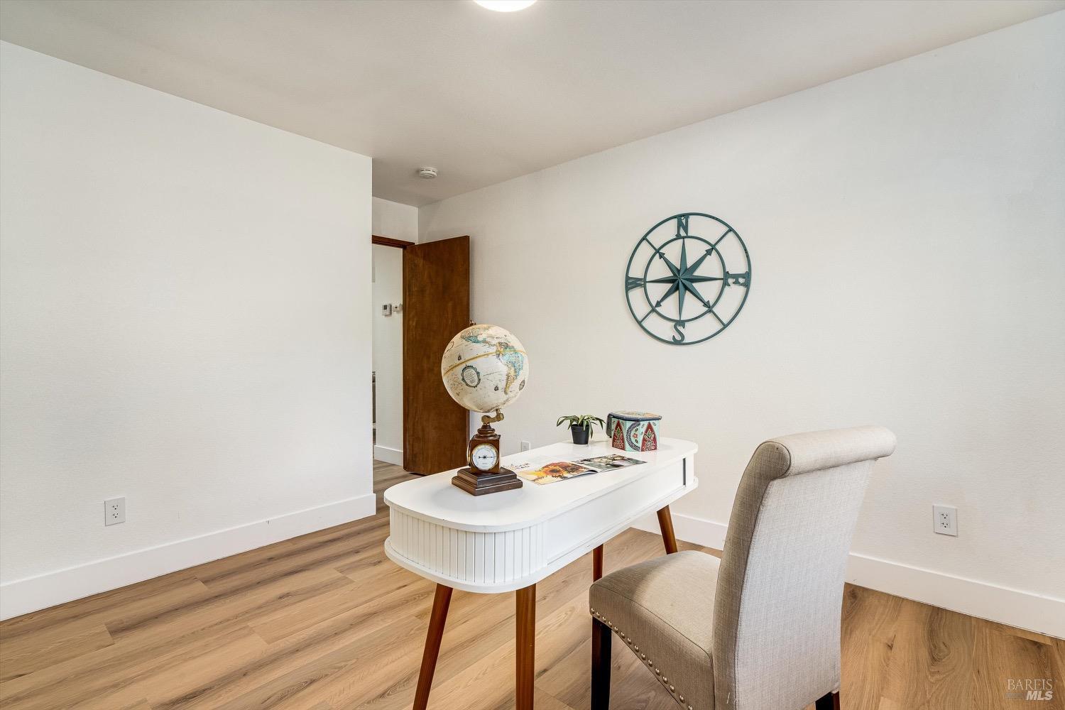 168 Ridgecrest Drive Napa, CA 94558 - Photo 8 of 39 a view of a dining area with furniture and wooden floor