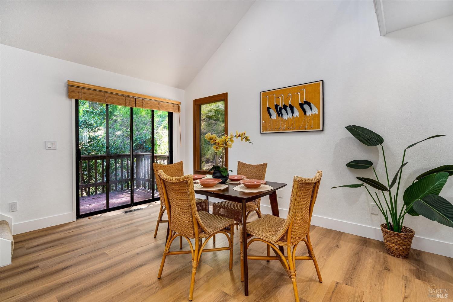 168 Ridgecrest Drive Napa, CA 94558 - Photo 9 of 39 a view of a dining room with furniture window and wooden floor