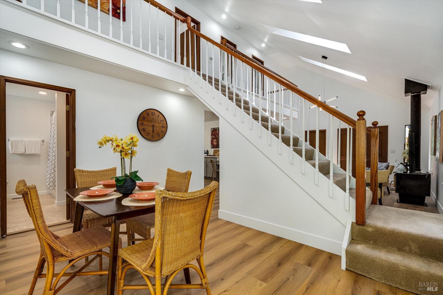 168 Ridgecrest Drive Napa, CA 94558 - Photo 10 of 39 a dining room with furniture and wooden floor