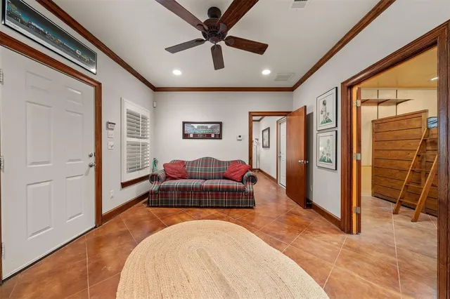 a spacious bedroom with a bed and a couch