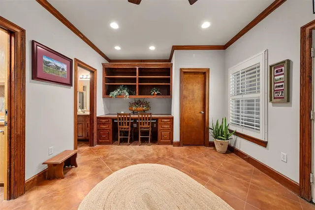 a spacious bedroom with a large bed and a window