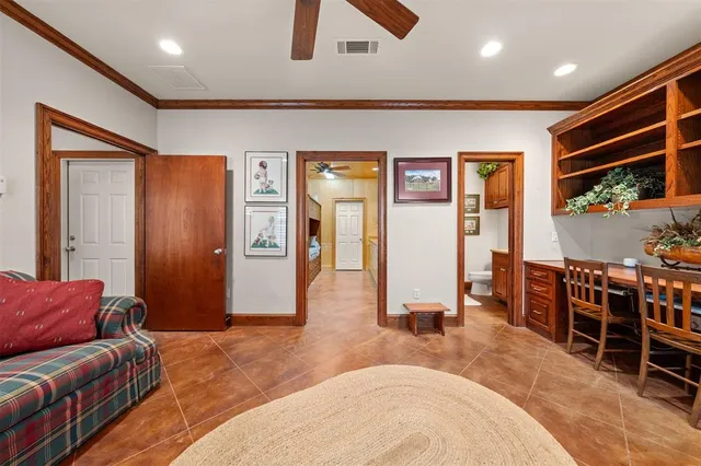 a living room with furniture a flat screen tv