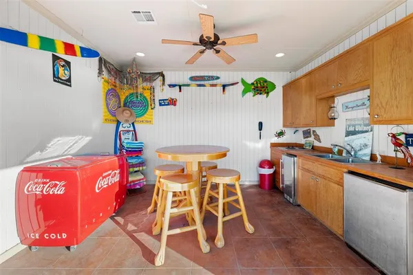 a very nice looking kitchen with a large window