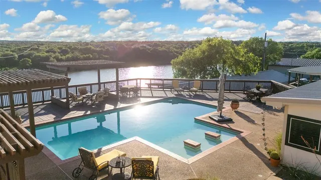 a view of a balcony with chairs