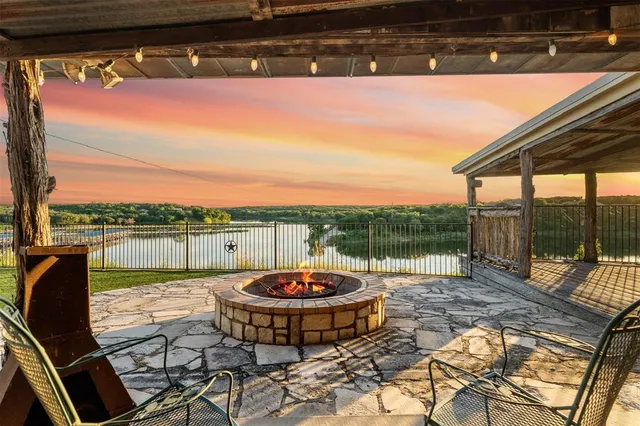 a view of a swimming pool with a patio
