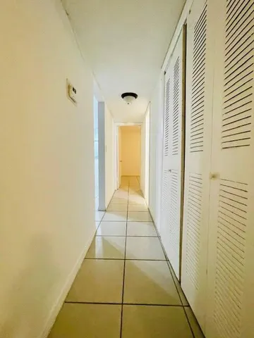 a bathroom with a toilet sink and shower