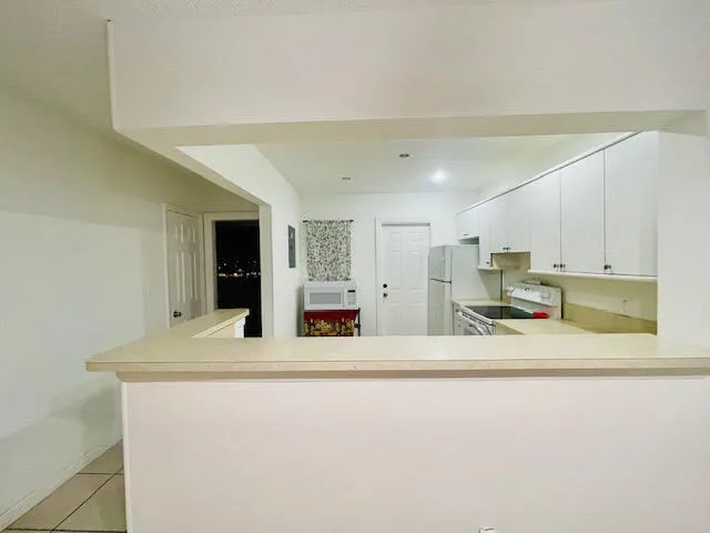 a front view of a building with street view