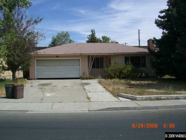 1390 Harvard Way Reno, NV 89502 - Photo 1 of 1 a front view of a house