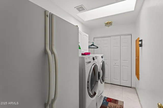 a bed room with a bed and a table