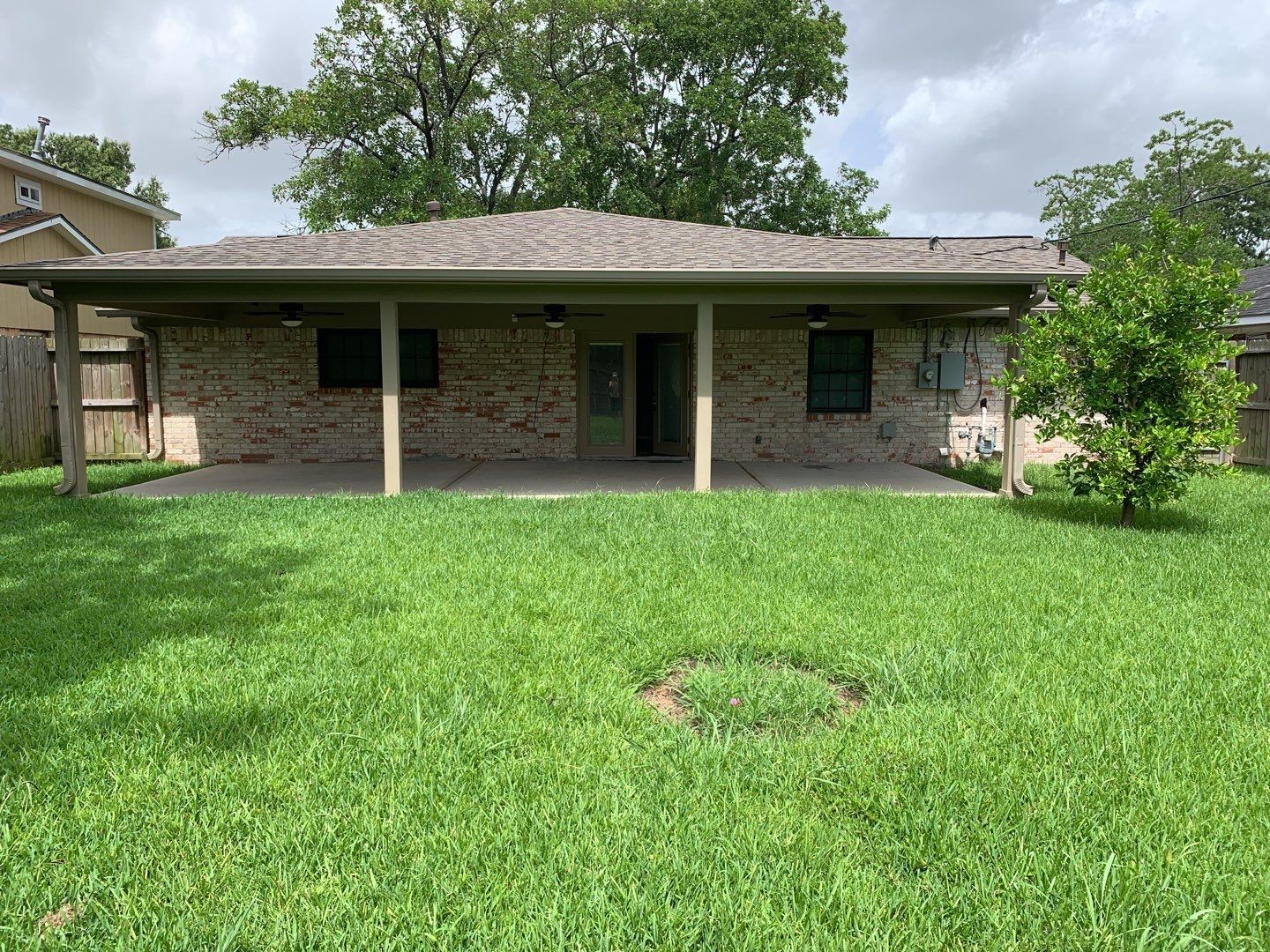 618 Overbluff Street Channelview, TX 77530 - Photo 30 of 32 a front view of a house with a garden