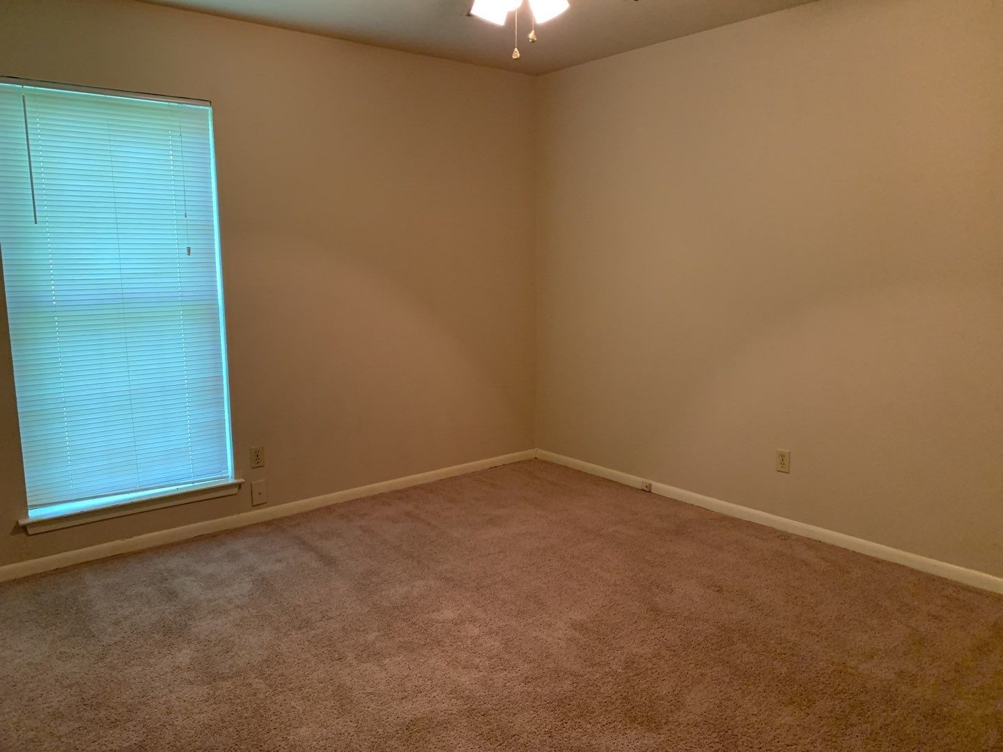 618 Overbluff Street Channelview, TX 77530 - Photo 9 of 32 an empty room with a empty space and a window