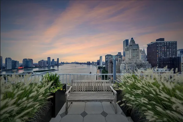 a view of a city with tall buildings