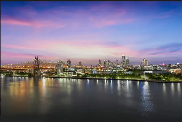 a view of residential houses with outdoor space and lake view