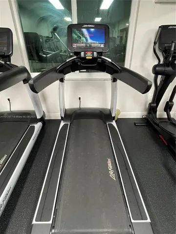 a view of a room with gym equipment