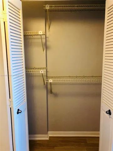 a bathroom with a sink and a shower