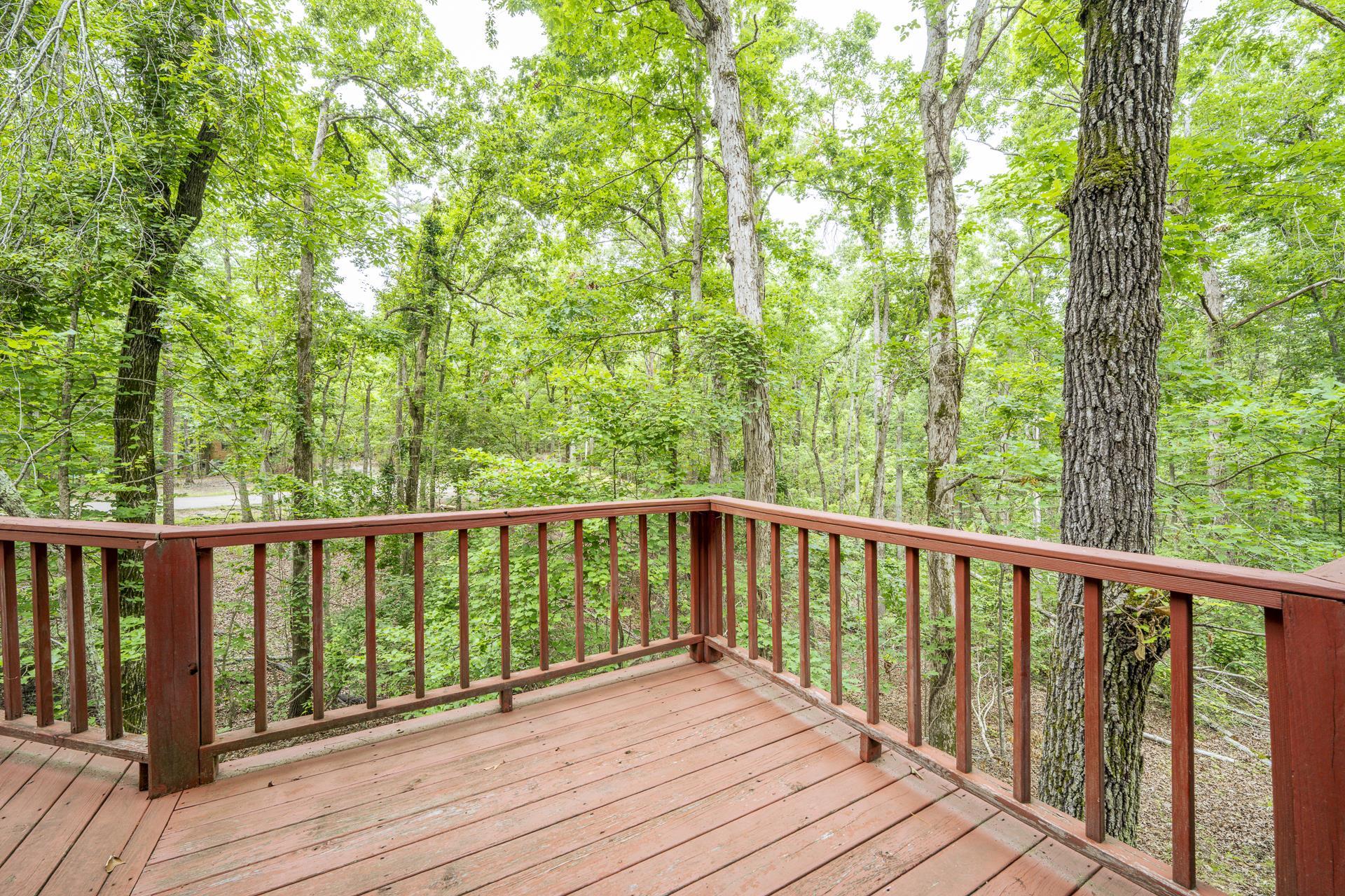 405 Murray Lane Counce, TN 38326 - Photo 30 of 36 a balcony with wooden floor and fence