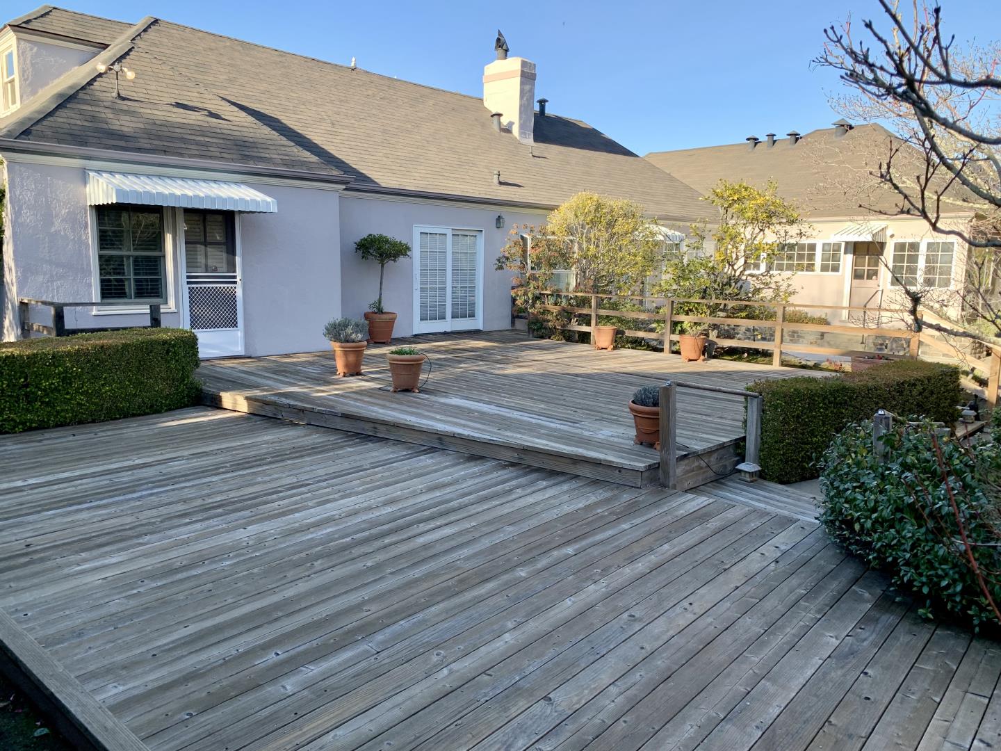 628 Alhambra Road San Mateo, CA 94402 - Photo 13 of 17 a view of a house with a patio