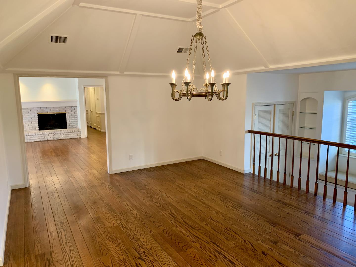 628 Alhambra Road San Mateo, CA 94402 - Photo 3 of 17 a view of a livingroom with wooden floor