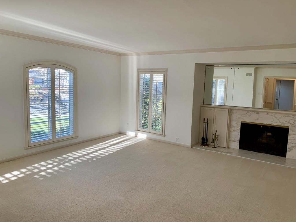 628 Alhambra Road San Mateo, CA 94402 - Photo 5 of 17 a view of a livingroom with a fireplace