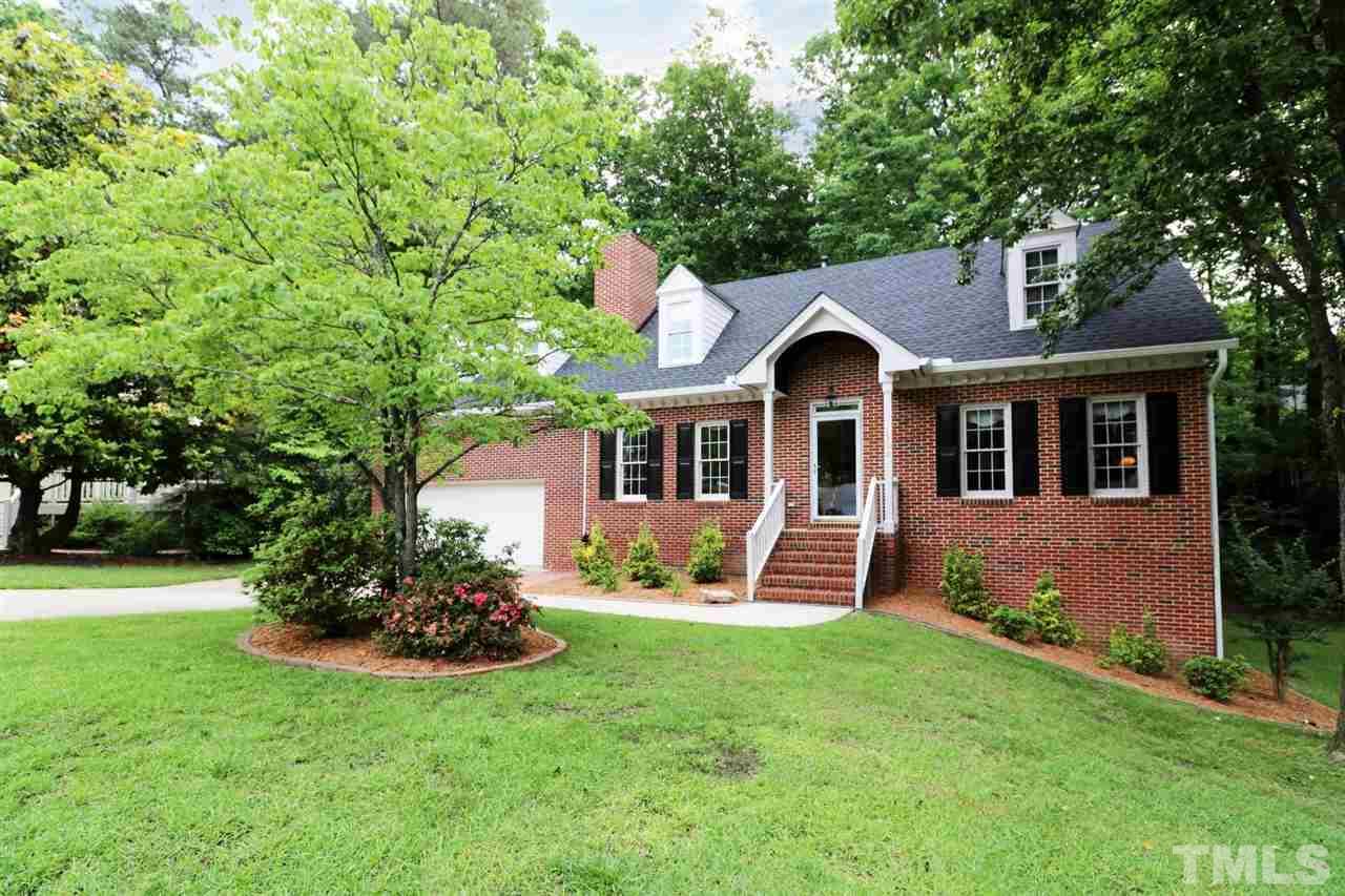 1500 Pecore Place Raleigh, NC 27615 - Photo 1 of 25 front view of a house with a yard