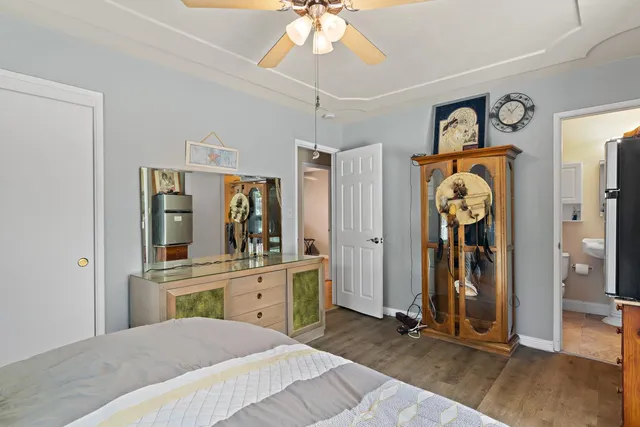 a bathroom with a sink toilet and mirror