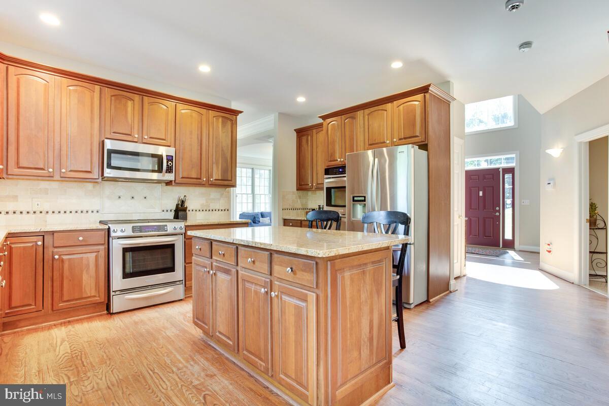 1183 Old County Road Arnold, MD 21012 - Photo 11 of 44 Kitchen with Granite Center Island