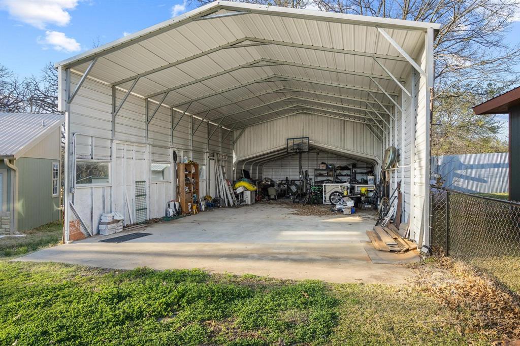 1053 Paradise Cove Road Pottsboro, TX 75076 - Photo 27 of 35 Extra large detached carport with workshop