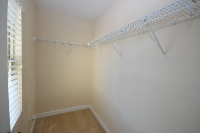 a view of a room with racks on the wall