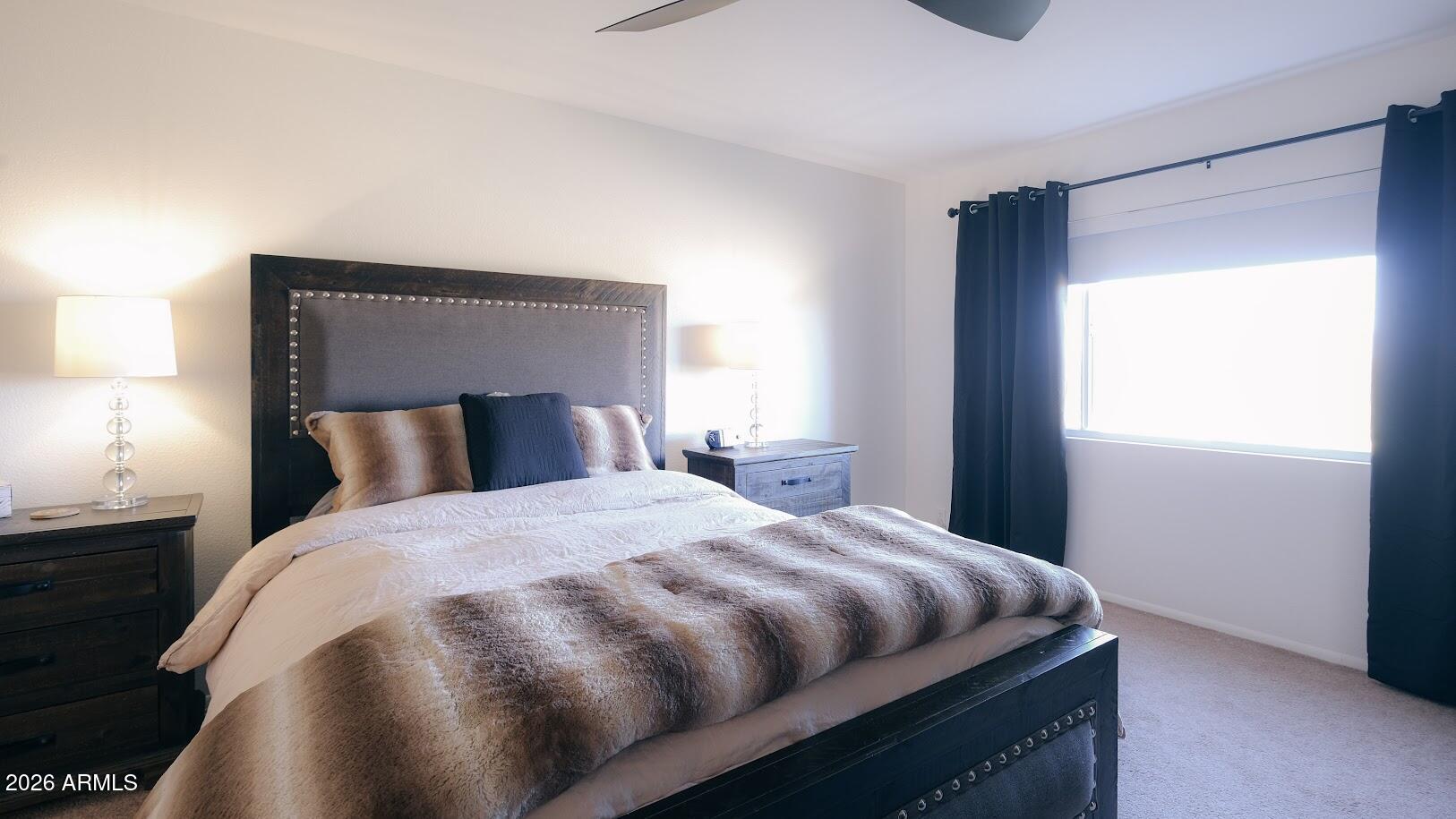 7940 East Camelback Road, Unit 608 Scottsdale, AZ 85251 - Photo 20 of 45 a bedroom with a bed and window