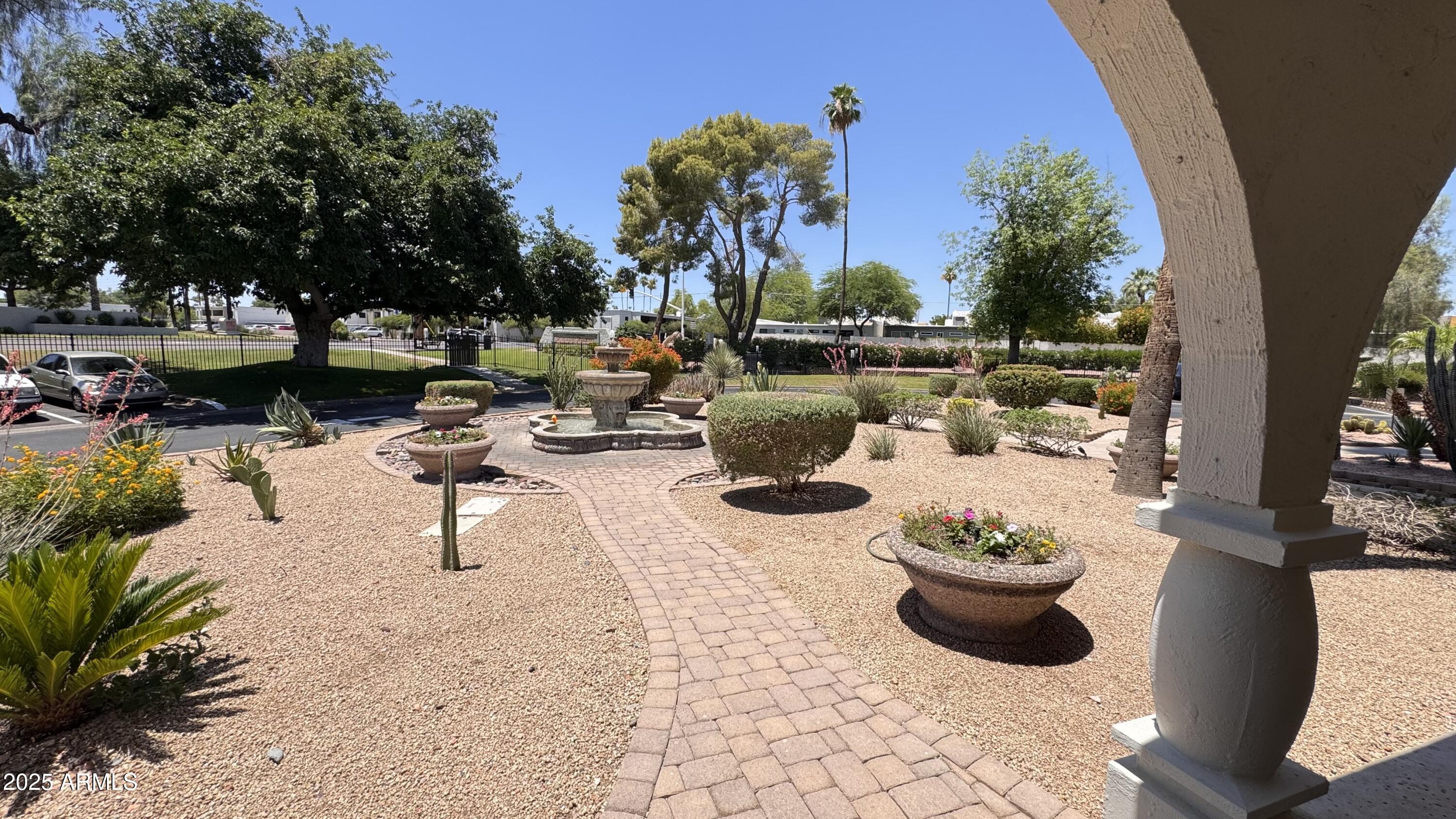 7940 East Camelback Road, Unit 608 Scottsdale, AZ 85251 - Photo 34 of 45 a view of a swimming pool with outdoor seating