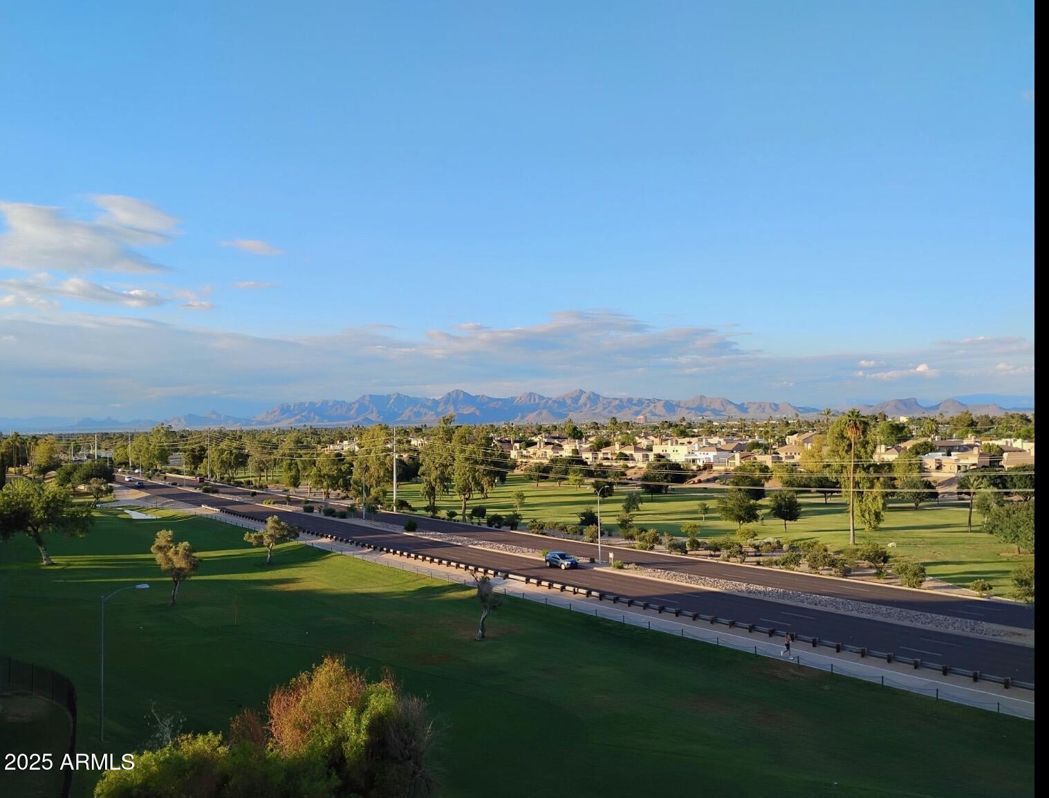 7940 East Camelback Road, Unit 608 Scottsdale, AZ 85251 - Photo 36 of 45 a view of a city with mountains in the background