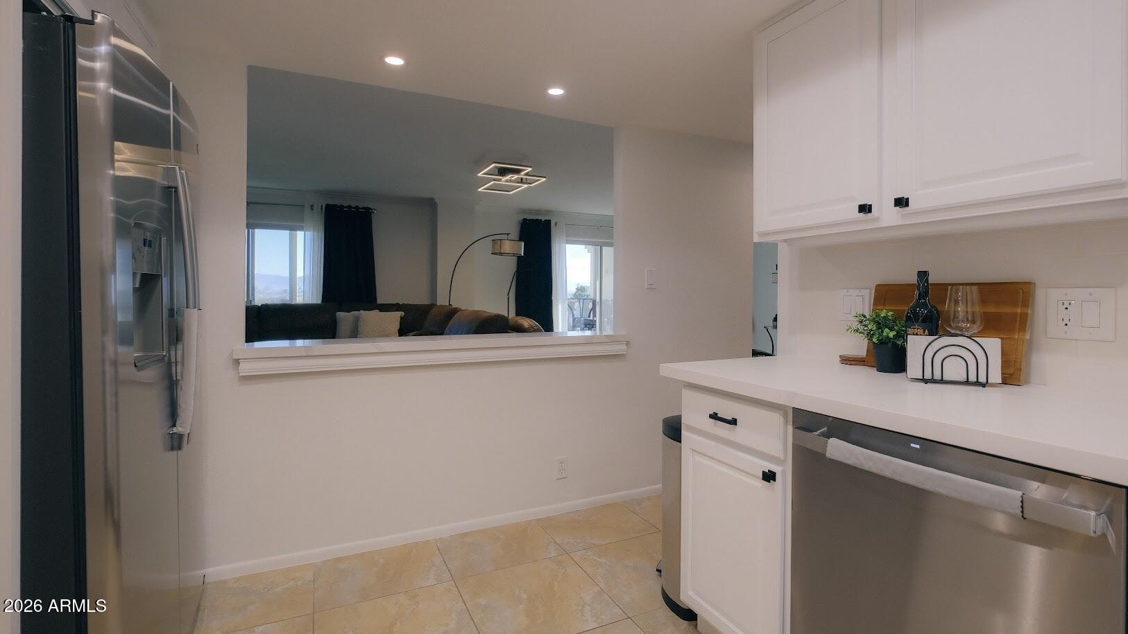 7940 East Camelback Road, Unit 608 Scottsdale, AZ 85251 - Photo 6 of 45 a room with a sink and a refrigerator