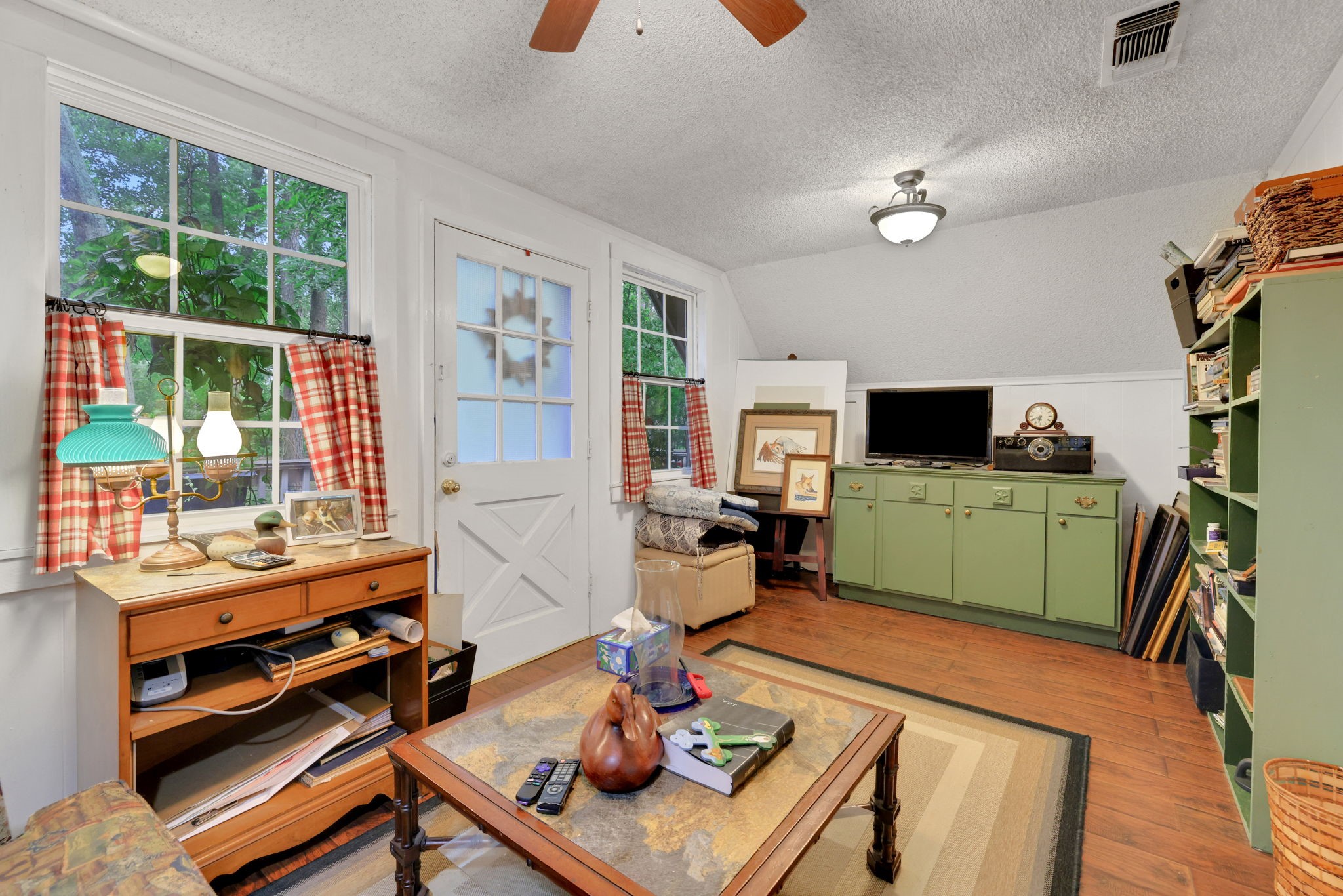 300 Timber Lane Coldspring, TX 77331 - Photo 26 of 43 a living room with furniture and a flat screen tv
