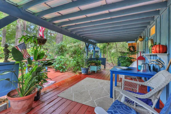 a outdoor living space with furniture and garden view