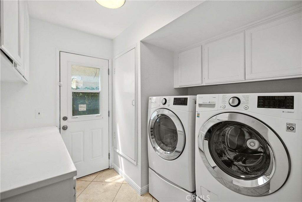 15 Colonial Irvine, CA 92620 - Photo 22 of 42 a utility room with dryer and washer