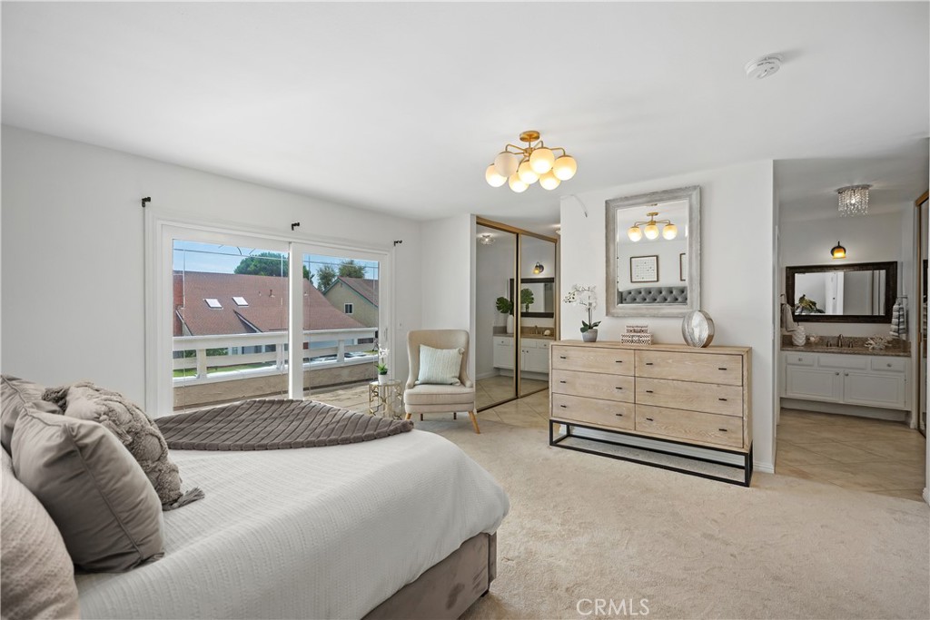 15 Colonial Irvine, CA 92620 - Photo 26 of 42 a bedroom with a bed and furniture