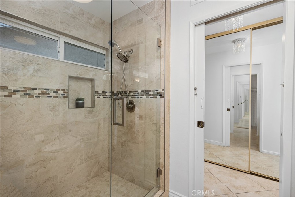 15 Colonial Irvine, CA 92620 - Photo 28 of 42 a bathroom with a shower