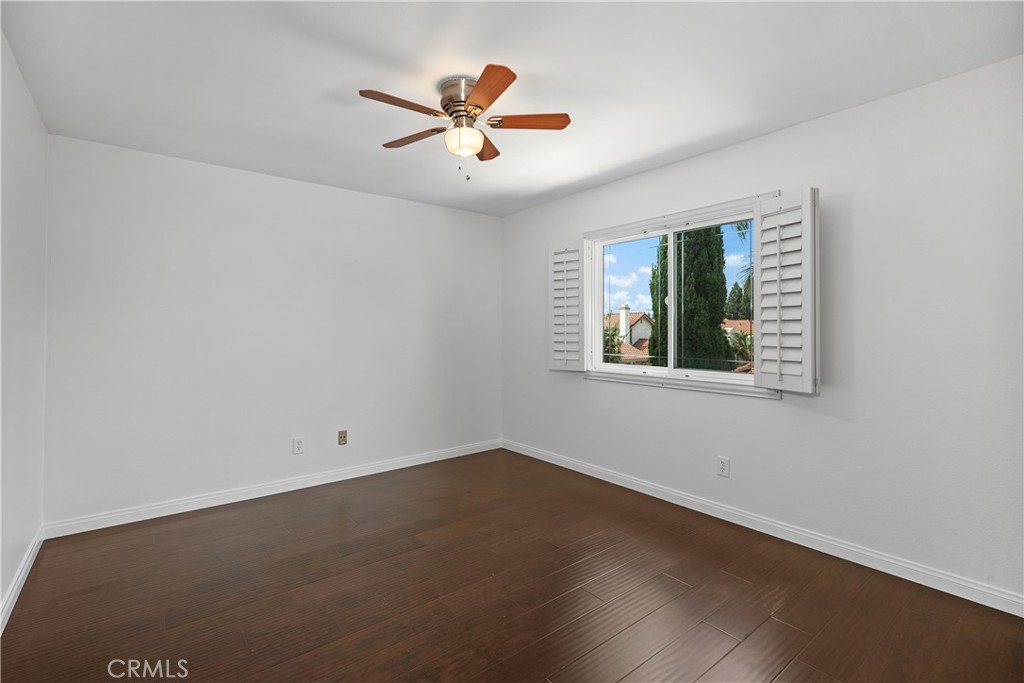 15 Colonial Irvine, CA 92620 - Photo 32 of 42 wooden floor in an empty room with a window