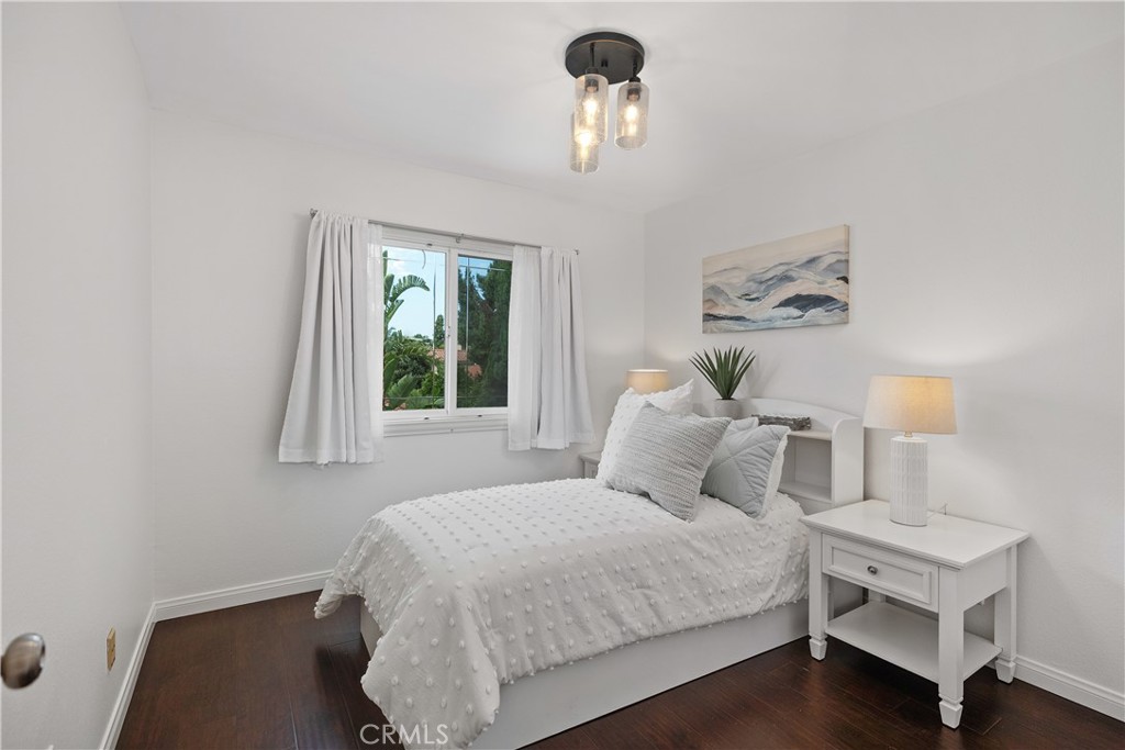 15 Colonial Irvine, CA 92620 - Photo 35 of 42 a bedroom with a bed and a window