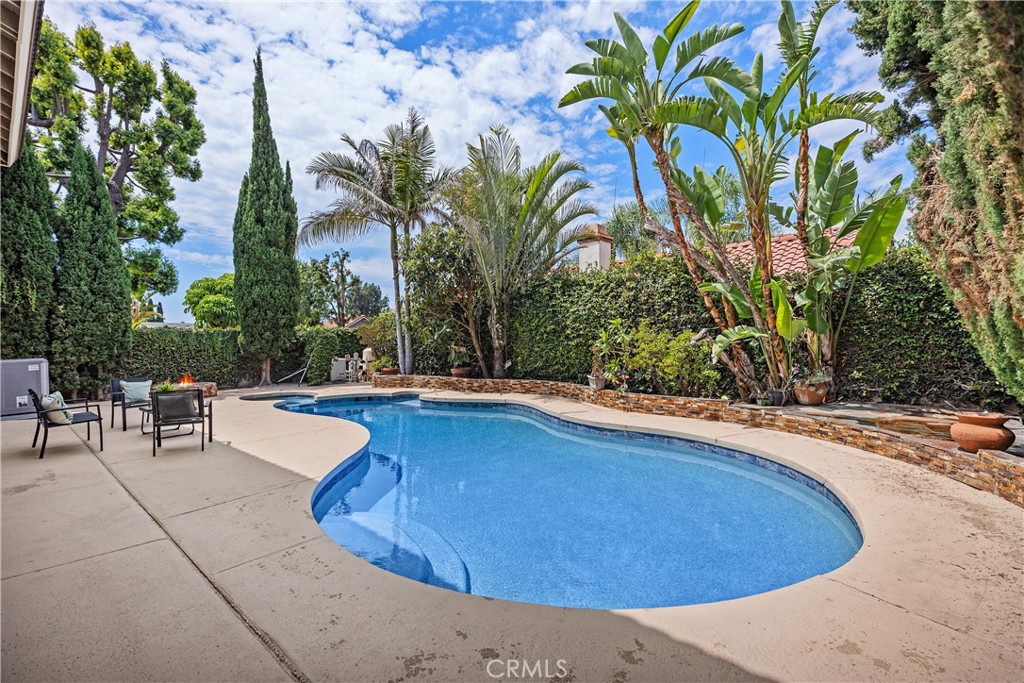 15 Colonial Irvine, CA 92620 - Photo 38 of 42 a swimming pool with outdoor seating and yard