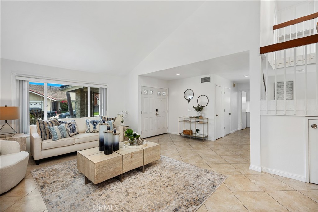 15 Colonial Irvine, CA 92620 - Photo 10 of 42 a living room with furniture and a couch