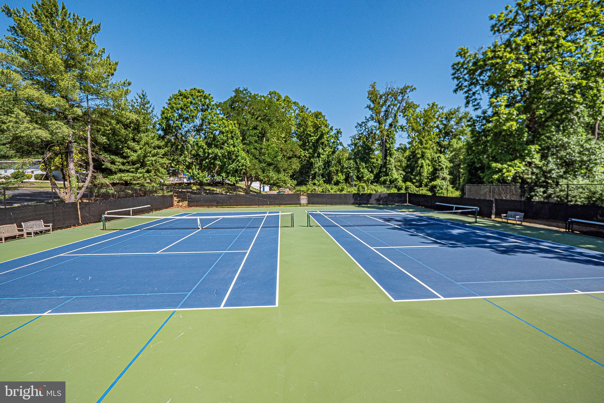 5448 Edsall Ridge Place Alexandria, VA 22312 - Photo 49 of 52 a view of a tennis court