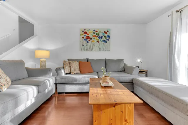 a living room with furniture and a couch