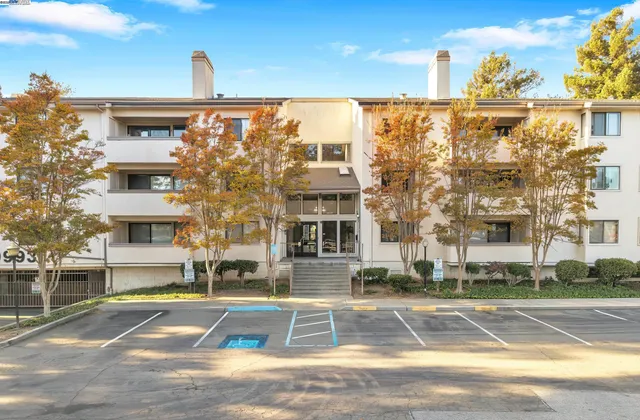 a view of a building with a swimming pool