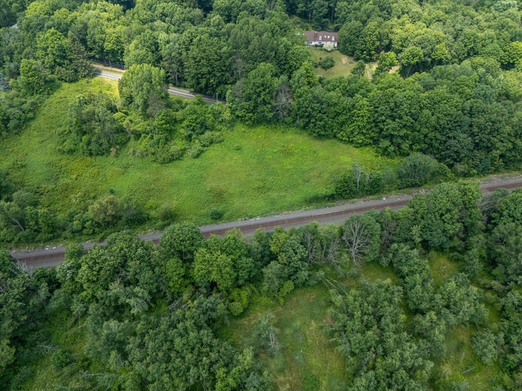 0 Cross Road West Stockbridge, MA 01266 - Photo 2 of 12 an aerial view of residential houses with outdoor space and trees