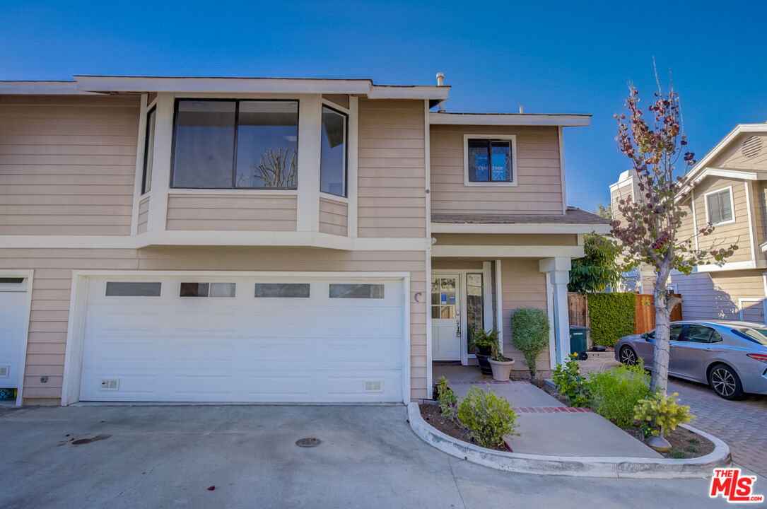 117 East Wilson Street, Unit C Costa Mesa, CA 92627 - Photo 1 of 23 a view of a house with a patio