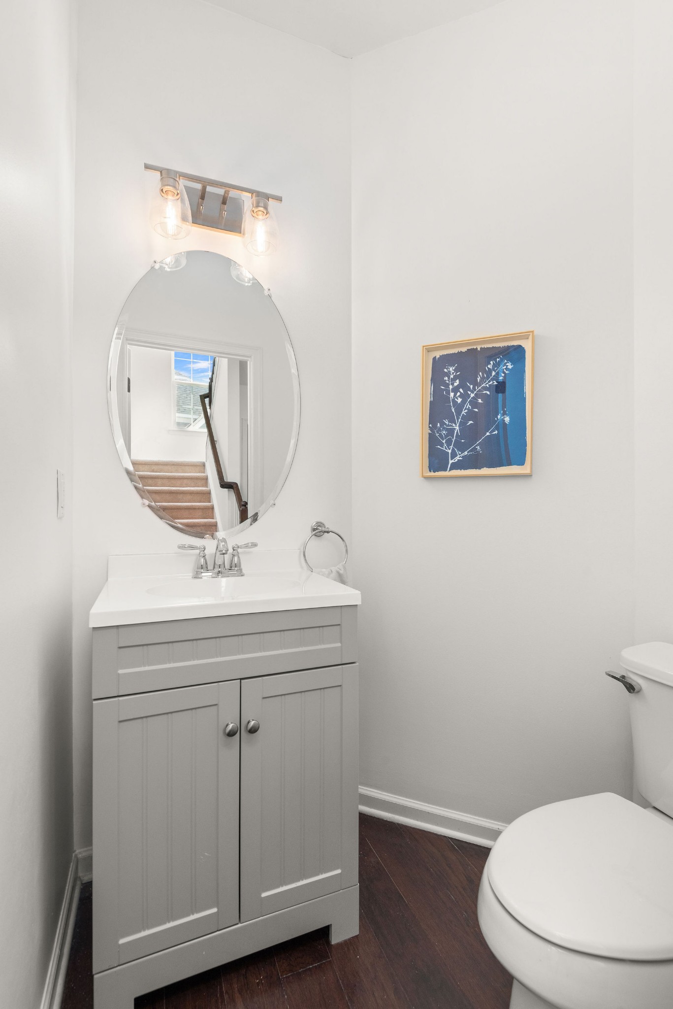 620 Streamside Lane Franklin, TN 37064 - Photo 22 of 45 a bathroom with a toilet a sink and mirror