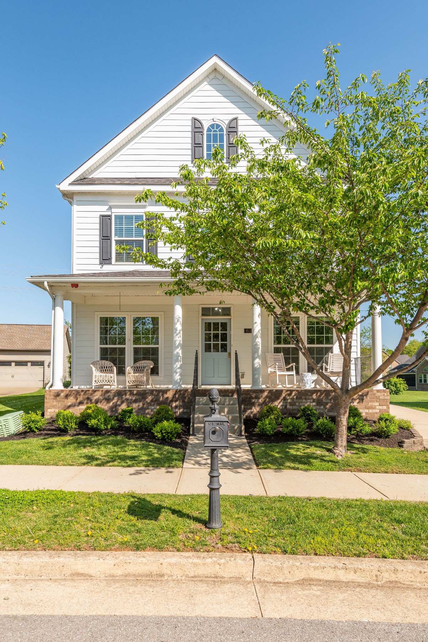 620 Streamside Lane Franklin, TN 37064 - Photo 3 of 45 a front view of house with yard and green space